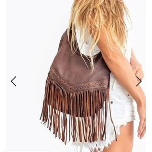 Very gently used fringe lambskin leather bag by Liberte  it is 12” X 14”